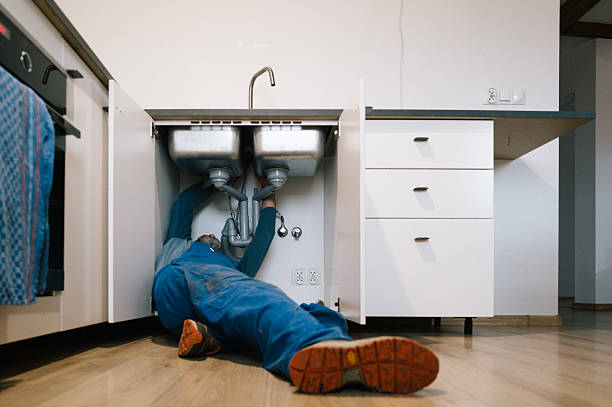 Professional Plumbing technician working in Quinebaug, CT